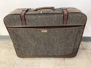 lot 5391 image: large American tourister suitcase