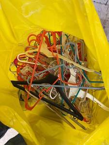lot 5416 image: 50 gallon trash bag of hangers