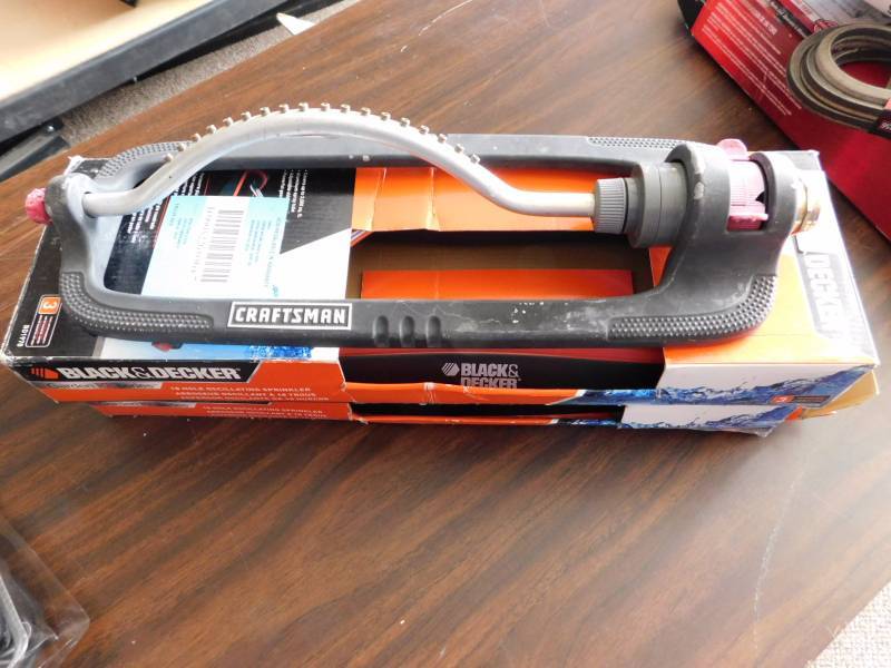 lot 1083 image: Craftsman Black & Decker oscillating sprinklers