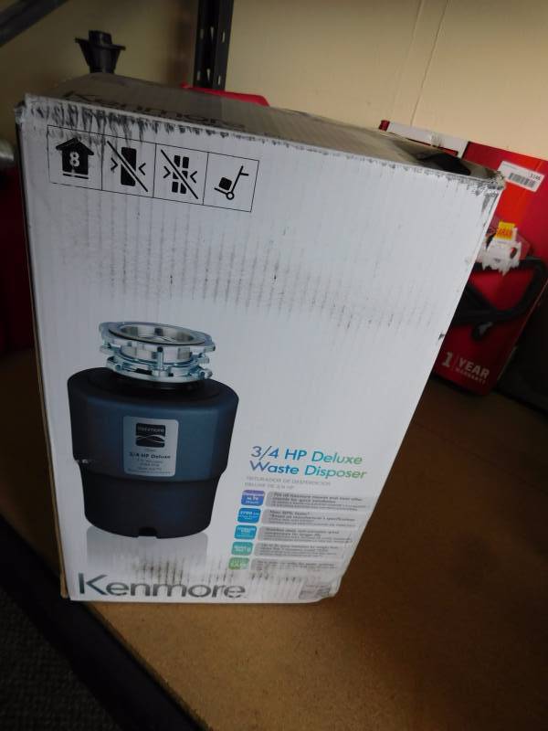 lot 1145 image: Kenmore 34 horse deluxe garbage disposal