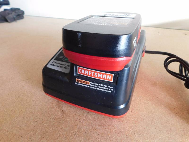 lot 1015 image: Craftsman charger and battery - 19.2volt