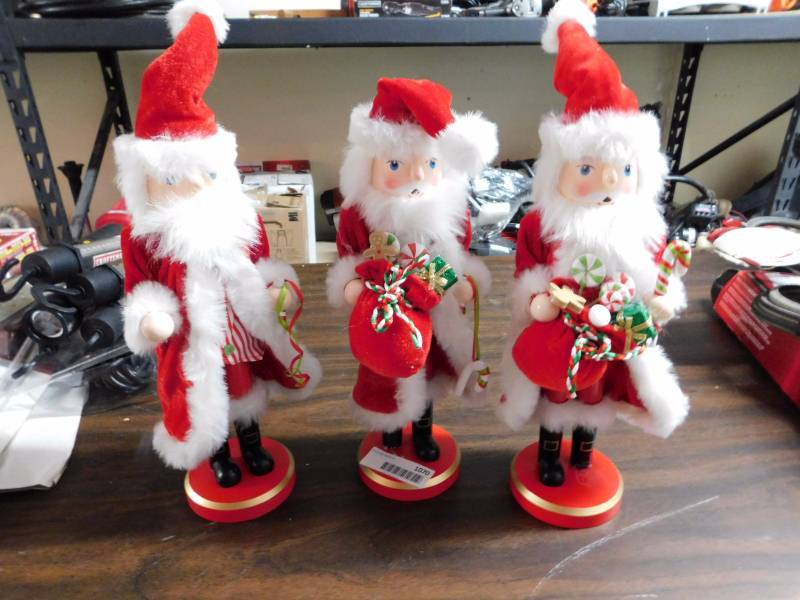 lot 1070 image: 3 Santa wooden statues