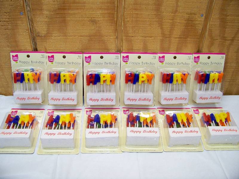 lot 2 image: 12 Boxes of 13 Cake Mate Happy Birthday Pick Candles