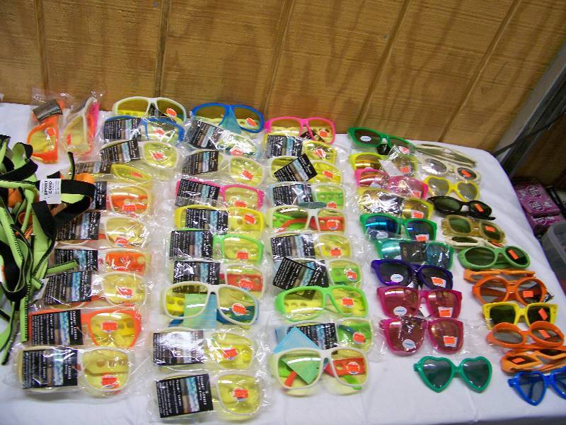 lot 80 image: 55 Pair Sunglasses and Driving Glasses and 64 Sports Cords