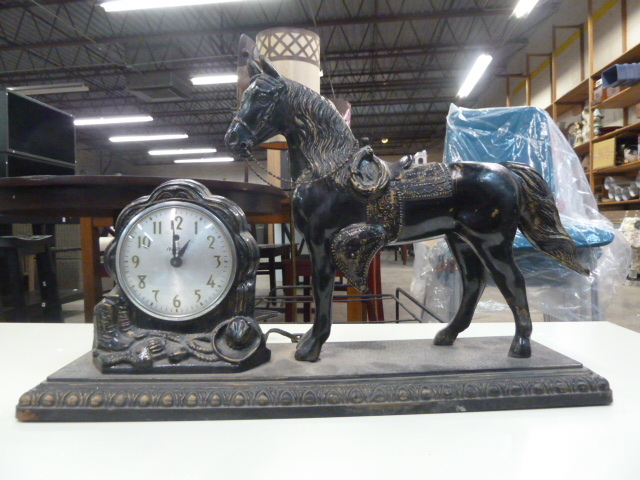 lot 6 image: VERY COOL OLD HORSE CLOCK