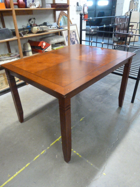lot 207 image: PRETTY DINING TABLE has a few imperfections