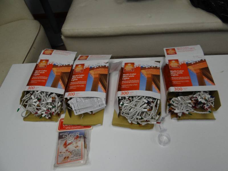 lot 2899 image: Large Assortment of Multi Color Mini Icicle Lights w Bendable Skier