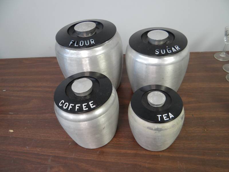 lot 2948 image: (4) Piece All Aluminum Sugar,Flour,Tea And Coffee Container Set w Lids