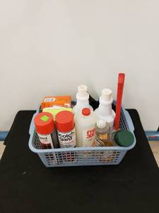 lot 5432 image: tub of cleaning supplies