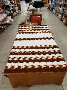lot 5665 image: brownwhite crocheted throw