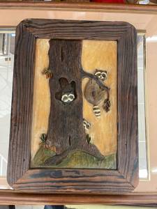 lot 8545 image: hand carved raccoon wall art