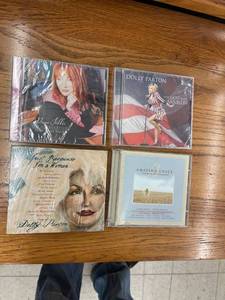 lot 8559 image: 3 unopened cds 1 opened