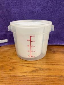 lot 8561 image: 5 qt container full of napkins & plates