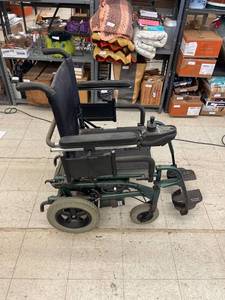 lot 8590 image: quickie electric wheel chair