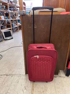 lot 8610 image: red suitcase