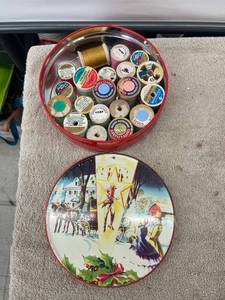 lot 9111 image: vintage fruit cake tin of thread