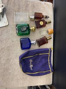 lot 9152 image: crown royal bag full of cologne bottles