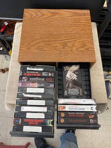 lot 9176 image: vhs case and tapes