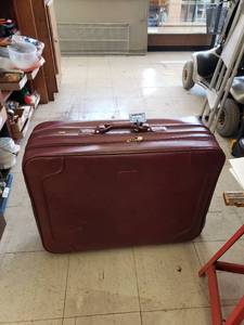 lot 9340 image: maroon suitcase