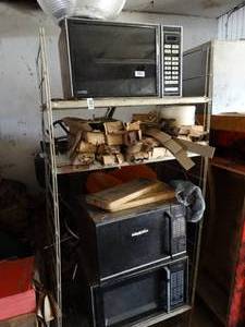 lot 1036 image: Contents on Metal Rack  Microwaves and More