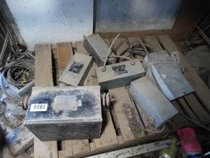 lot 1073 image: Variety of Neon Light Transformers  On Bottom Shelf