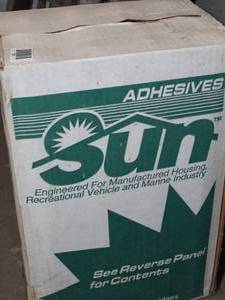 lot 1245 image: (1) Box of Sun Adhesives Caulking