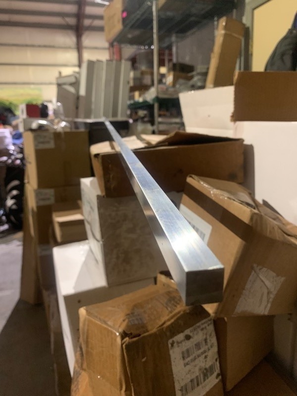 lot 682 image: 1 New Solid Aluminum 12x12x96 Bar Trim Piece