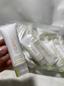 lot 48 image: 1 Giant Bag of 50 EarthTempo Body Care Travel Sized Bottles of Conditioner