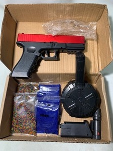 lot 67 image: Crystal Bullet Series Outdoor Extreme Activity G-Cock Water Bead Gun w Safety Googles and LOTS of ammo