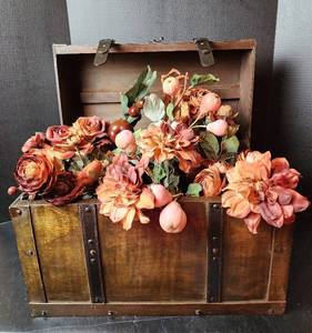 lot 131 image: Wooden Trunk 20x11x14 and Faux Flowers (located in basement)