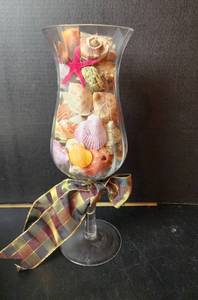 lot 132 image: Glass Hurricane Vase Full of Seashells 16 Tall (located in basement)