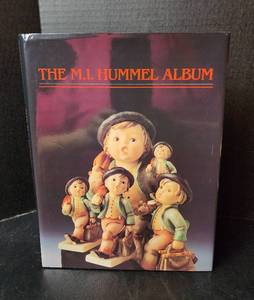 lot 139 image: The M.I. Hummel Album - Hardback Book (located in basement)