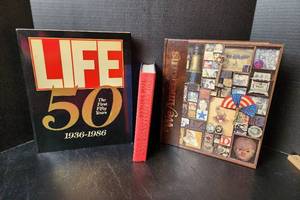 lot 141 image: National Geographic We Americans - Hardback Book, The Greatest Generation by Tom Brokaw - Hardback Book, and Life The First 50 Years 1936-1986 - Paperback Book (located in basement)