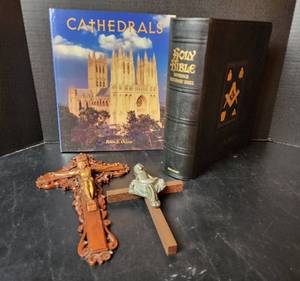 lot 147 image: Holy Bible with Reference Dictionary Index, Cathedrals Book, and (2) Crucifix (located in basement)
