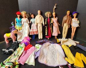 lot 152 image: Vintage Barbie Dolls, Case, and Accessories (located in basement)