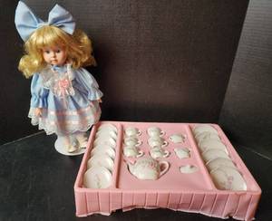 lot 163 image: New Porcelain Tea Set and Porcelain Doll on Stand (located in basement)