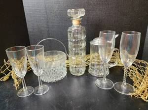 lot 186 image: Glass Decanter with (4) Drink Glasses, Ice Bucket, and Glass Beer Stein (located in basement)