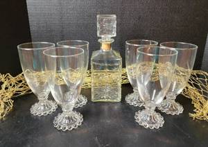 lot 187 image: Glass Decanter with (6) Drink Glasses (located in basement)