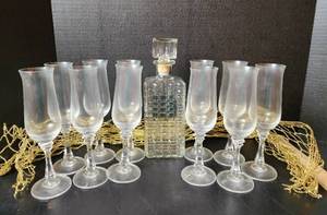 lot 188 image: Glass Decanter with (11) Drink Glasses (located in basement)