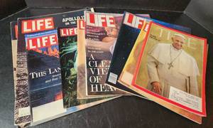lot 195 image: Special Editions of Time and Life Magazines (located in basement)