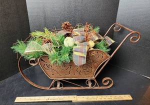 lot 257 image: 24 Metal Sleigh and Faux Arrangement (located in basement)