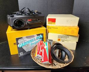 lot 267 image: Kodak 600 Carousel Projector, (4) Slide Trays, Projector Screen, and Accessories (located in basement)