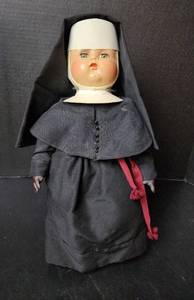 lot 270 image: 16 Antique Nunn Doll (Doll is Wooden and eyes open and close) located in basement