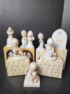 lot 282 image: (7) Vintage Precious Moments Figurines (located in basement)