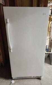 lot 297 image: Frigidaire Upright Freezer Model #LFFU1424DW15 Mfg. 11-2010 28x28.5x60 (powers on) Located in Basement