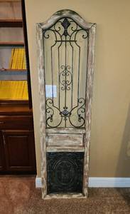 lot 312 image: Rustic Ornamental Wood and Iron Wall Decor 19x72 (located in basement)