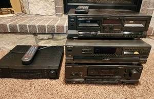 lot 317 image: Technics Stereo System with Remote, Stereo Cassette Deck (RS-TR262), Compact Disk Changer 5-Disk (SL-PD887), AV Control Stereo Receiver (SA-GX690), and RCA Home Theater HiFi VHS Player with Remote (VR-676HF) - Located in Basement