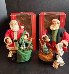 lot 548 image: (2) Dillards Santa Collectables
