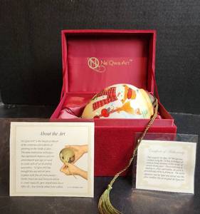 lot 553 image: NIB NeQwa Art (Reverse Hand Painted on Inside of a Blown Glass Christmas Ornament) with COA