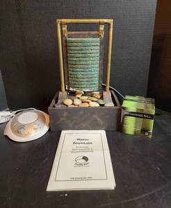 lot 592 image: Water Fountain, Zen Massage Ball, and Homedics Sound Machine